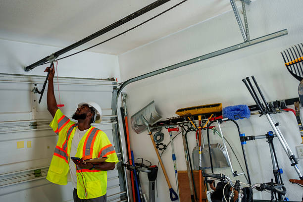 Professional Garage Door Roller Replacement technician working in Dania Beach, FL